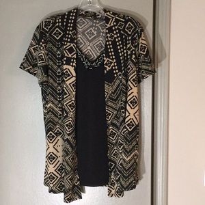 Lavish brand designer Lady’s top; Size: Large